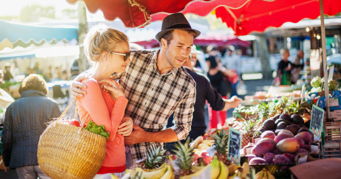 couple shopping at local farmer's market